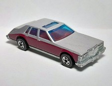 Hot Wheels Cadillac Seville Lowrider, Metalflake Maroon with White Pinstripe Panels — listing 2