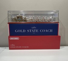 Die-Cast Model Gold State Coach with Eight-Horse Team and Postilion Riders