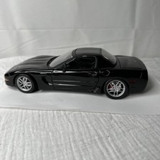 1953-1955 Chevrolet Corvette C1 Convertible 1:18 Scale Diecast Model in Harvest Gold/Yellow with Black Soft Top — listing 4