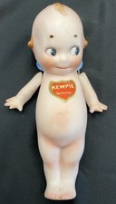 Bisque Kewpie-Style Doll with Blue Hair Bow and Jointed Arms