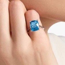 Sterling Silver Cocktail Ring with Faceted Blue Topaz-Style Center Stone and Pavé Accents