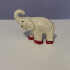Ceramic Elephant Figurine with Raised Trunk, Cream Glaze