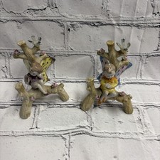 Porcelain Fairy Figurine Seated on Pink Lotus Flower with Green Butterfly Wings — listing 5