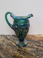 Iridescent Green Carnival Glass Tall Pitcher with Floral Relief — listing 4