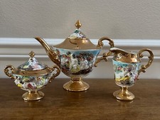 Capodimonte Italian Gold Porcelain Tea Set with Cherub Relief — listing 3