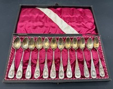Set of 3 Ornate Silver-Plate Demitasse Teaspoons with Scrollwork Handles It's a name/logo I can't quite read — listing 2