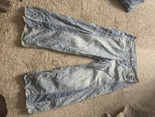 Wide-Leg Medium Wash Denim Jeans with Angled Yoke Detail