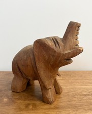 Carved Wood Elephant Figurine with White Floral Inlay Decoration
