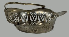 Antique Silverplate Pierced Bonbon / Sugar Sifter Spoon with Repoussé Floral Bowl Has a maker's name / symbol — listing 6