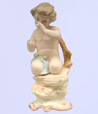 White Bisque Porcelain Cherub Angel Figurine with Wings, Resting Head on Hands — listing 6