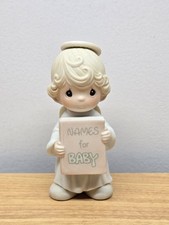 Precious Moments Angel Figurine Holding "Names for Baby" Book — listing 4