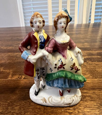 Vintage Ceramic Figurine of Boy Piggybacking Girl with Puppy and Bird on Tree Stump — listing 5