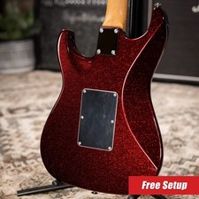 Suhr Electric Guitar (foreground headstock) with additional guitars on stand — listing 5