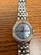Citizen Eco-Drive Women's Diamond Watch, Model EW2460-56A, Mother-of-Pearl Dial