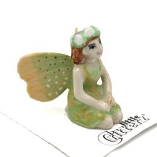Porcelain Fairy Figurine Seated on Pink Lotus Flower with Green Butterfly Wings — listing 2