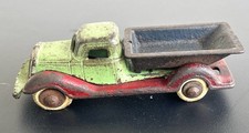 Cast Iron Toy Dump Truck with Nickel Driver and White Rubber Tires
