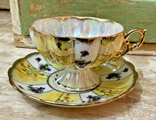 Vintage Lusterware Floral Teacup and Saucer with Heavy Gold Trim — listing 3