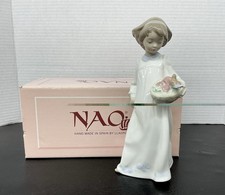 NAO by Lladró Porcelain Girl Figurine in Long Dress Holding Skirt — listing 4