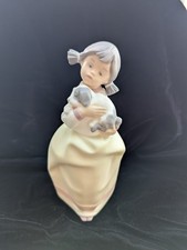 Porcelain Figurine of Girl in Flowered Hat with Puppy and Flowers — listing 6