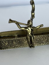 Figural Brass Miniature Cup with Two Seated Male Figures — listing 3