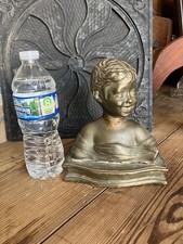 Cast Plaster Sculpture of a Seated Child Holding a Toy Car — listing 3