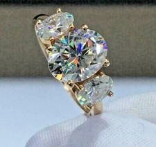 Three-Stone Round Brilliant Diamond Ring in White Metal Setting — listing 2