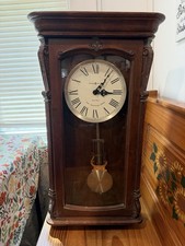 Howard Miller Oak Octagon Schoolhouse-Style Chiming Wall Clock with Pendulum — listing 3