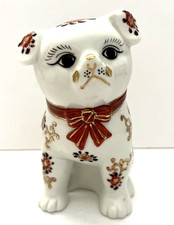 Imari-Style Porcelain Recumbent Dog Figurine with Floral Decoration
