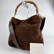 Vintage Gucci Bamboo Handle Black Leather Handbag with Dome Top Yes, serial number present