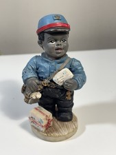 Resin Figurine of Seated African American Girl Holding Baby Doll — listing 6