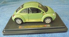 Pair of Die-Cast Toy Cars — Teal VW Beetle & Pink/White 1950s Station Wagon — listing 5
