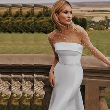 Long-Sleeve White Ruched Bridal Gown with Boat Neckline and High Slit — listing 4