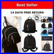 Black Nylon and Faux Leather Flap-Top Mini Backpack with Zip Front Pocket Yes - logo stamped on hardware/zippers — listing 4