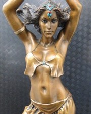 Bronze-Finish Sculpture of a Standing Female Nude Dancer, Arms Raised Overhead
