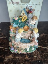 Cast Resin Cherub Tabletop Fountain with Shell Basin and Putti Figures — listing 2