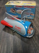 Vintage Battery-Operated Tin & Plastic Black Smoking Space Robot with Litho Chest and Red Feet — listing 4