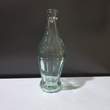 Vintage Coca-Cola Embossed Green Hobbleskirt Contour Bottle