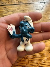 1982 Schleich Peyo Smurf PVC Figure Carrying Cake on Original Wallace Berrie Card — listing 6