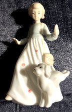 Porcelain Figurine of Girl in Flowered Hat with Puppy and Flowers