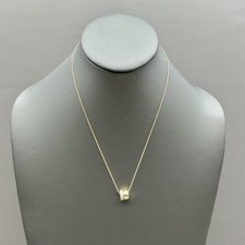 Gold-Tone Rhinestone Pendant Necklace with Faceted Red Diamond-Shaped Stone — listing 2