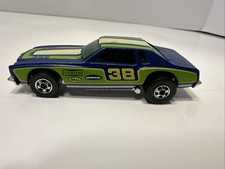 Hot Wheels Blackwall Chevy Monte Carlo Stocker #38, Blue with Green/Yellow Stock Car Tampos