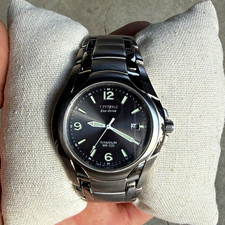 Citizen Eco-Drive Titanium Day-Date Watch with Champagne Dial
