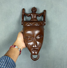 Hand-Carved Wooden Tribal Mask with Elongated Face and Geometric Scarification Motifs — listing 6