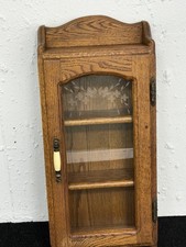 Vintage Oak Wall-Mounted Cabinet with Carved Foliate Panel Door