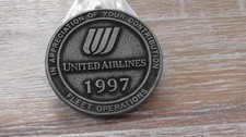 United Airlines Information Security & Compliance Team FOS Challenge Coin — listing 5
