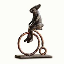Resin Figurine of Anthropomorphic Rabbits Riding an Antique Bicycle with Flower Basket