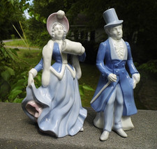 Vintage Crown N Porcelain Figurine of a Seated Lady with Flowers, Made in Germany