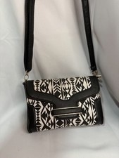 Kiss Me Couture Mauve Vegan Suede Saddle Crossbody Bag with Tooled Floral Embossing and Whipstitch Trim — listing 3