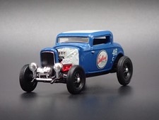 Diecast Blue Coupe Sports Car (approx. 1:64 scale)