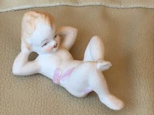 White Bisque Porcelain Cherub Angel Figurine with Wings, Resting Head on Hands